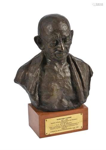 A bronzed portrait bust of Mohandas Gandhi