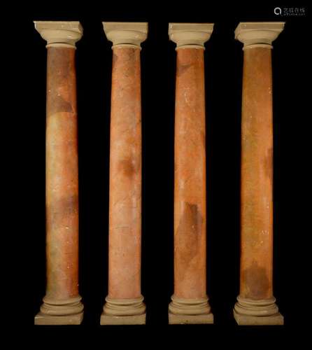 A set of four composite simulated marble columns