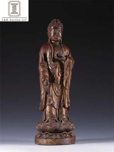 A Chinese Gilt Bronze Standing Buddha Statue