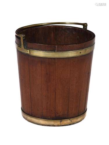 A George III mahogany and brass bound peat bucket