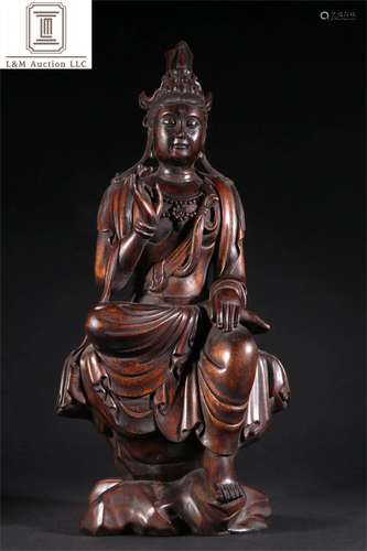 A Chinese Carved Agarwood Guanyin Statue