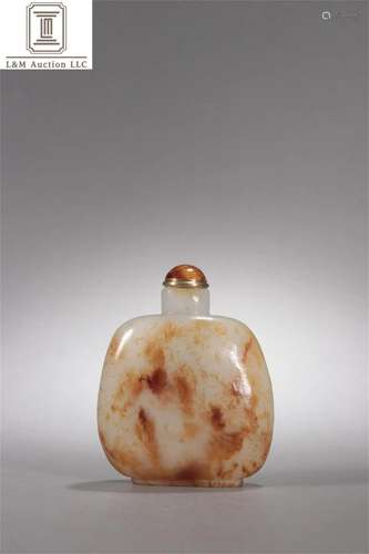 A Chinese Carved Jade Snuff Bottle