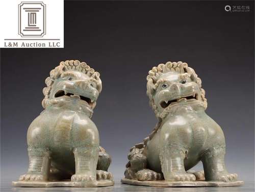 Pair of Celadon Glazed Porcelain Ornaments