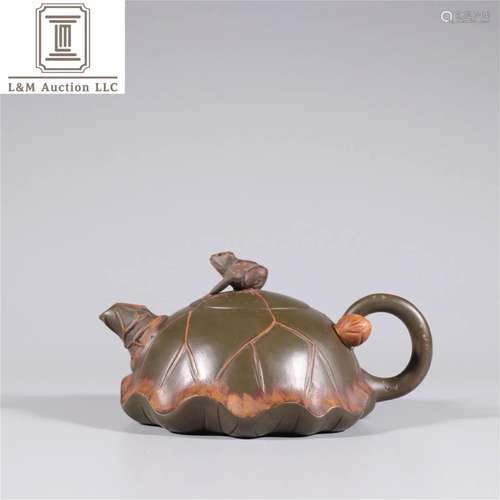 A Chinese Yixing Zisha Lotus Shaped Teapot