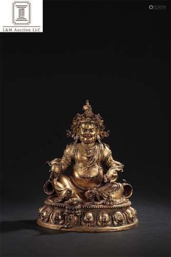 A Chinese Gilt Bronze God of Wealth Buddha Statue