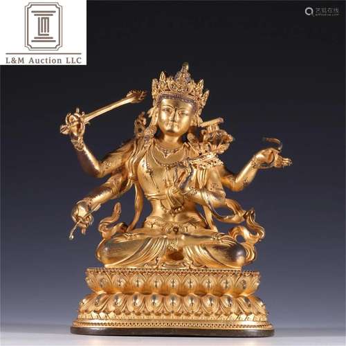 A Chinese Gilt Bronze Guanyin Statue