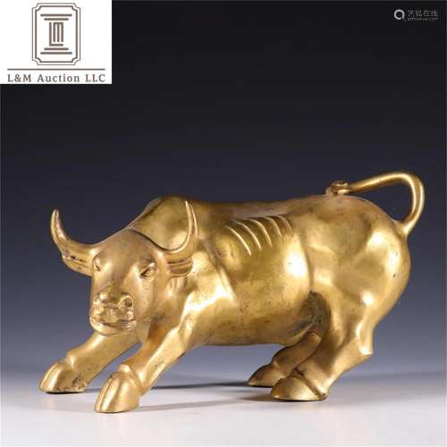 A Chinese Gilt Bronze Bull Shaped Ornament