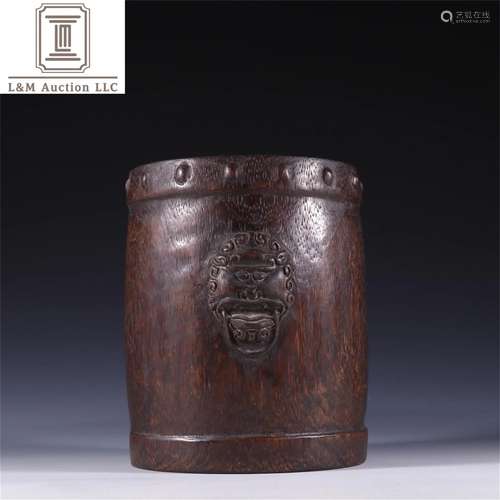 A Chinese Carved Agarwood Beast Patterned Brush Pot