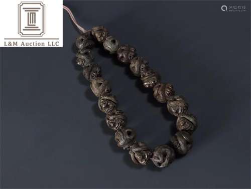 A Chinese Carved Agarwood Bracelet