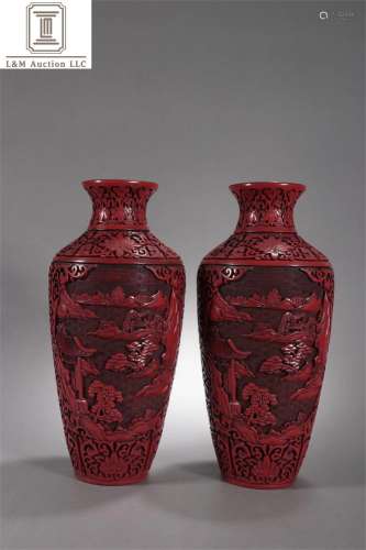 A Pair of Carved Lacquer Landscape Patterned Vases