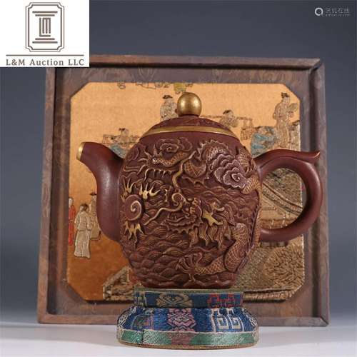 A Chinese Yixing Zisha Dragon Teapot