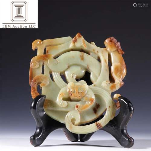 A Chinese Carved Jade Beast Patterned Bi Decoration