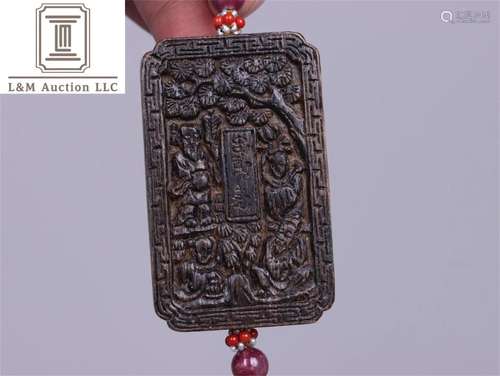 A Chinese Carved Agarwood Pendant with Eight Immortals