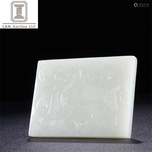 A Chinese Carved Jade Kylin Patterned Slab