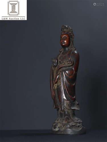 A Chinese Bronze Ruyi Guanyin Statue