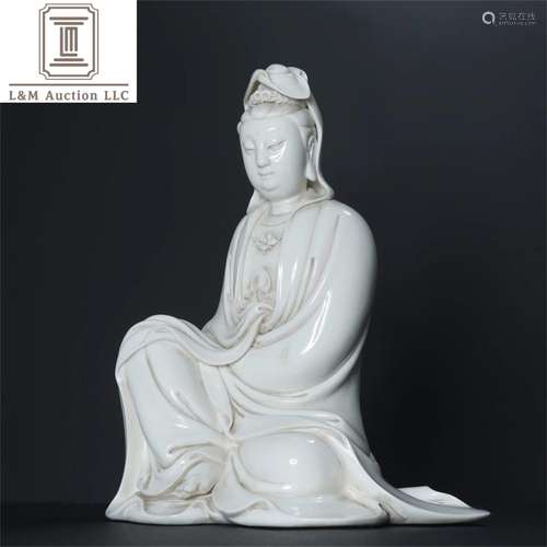 A Chinese White Glazed Porcelain Guanyin Statue