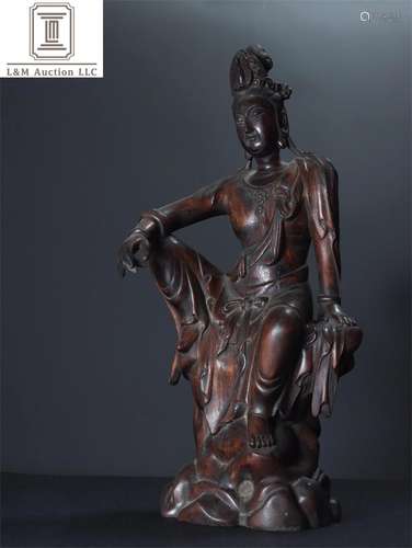 A Chinese Carved Agarwood Guanyin Statue