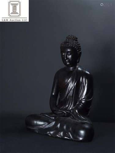 A Chinese Carved Hardwood Sakyamuni Buddha Statue