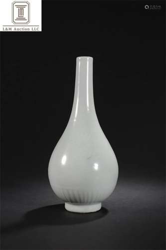 A Chinese White Glazed Porcelain Dragon Vase