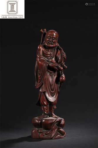 A Chinese Carved Agarwood Buddha Statue