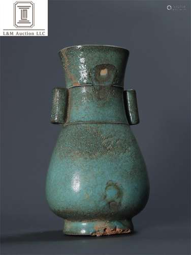 A Chinese Celadon Glazed Porcelain Vase