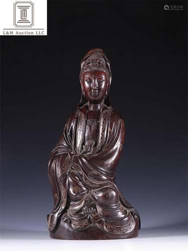 A Chinese Zitan Wood Guanyin Statue