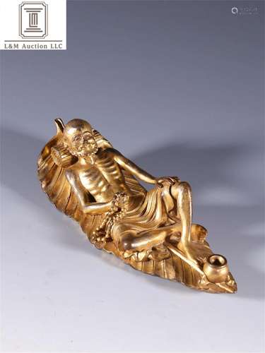 A Chinese Gilt Bronze Arhat Ornament