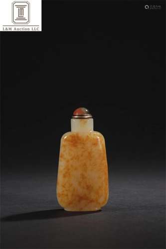 A Chinese Carved Jade Snuff Bottle