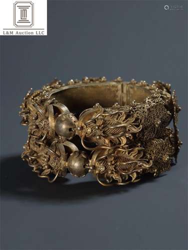 A Pair of Gilt Silver Dragon Patterned Bracelets