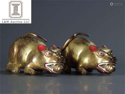 A Pair of Gilt Bronze Beast Shaped Ornaments