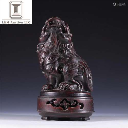 A Chinese Carved Zitan Wood Beast Shaped Decoration