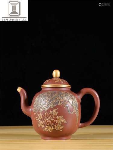 A Chinese Carved Yixing Zisha Teapot