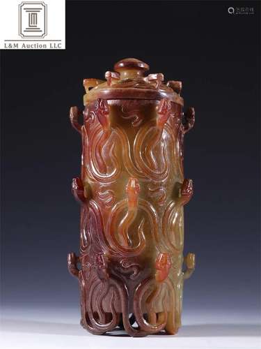 A Chinese Jade Dragon Patterned Jar with Lid