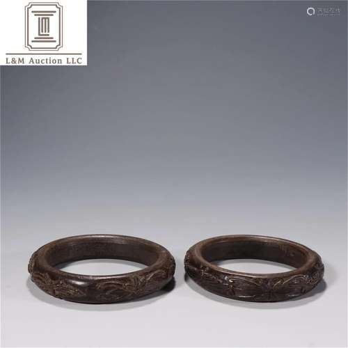 A Pair of Carved Agarwood Butterfly Patterned Bracelets