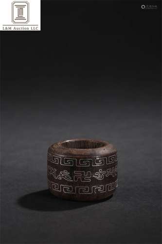 A Chinese Carved Agarwood Filigreed Thumb Ring