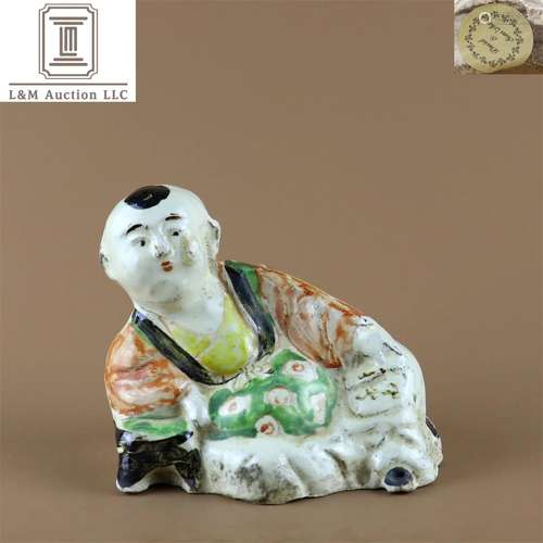 A Chinese Red & Green Porcelain Boy Statue