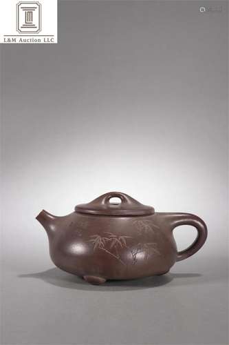 A Chinese Yixing Zisha Teapot with Bamboo Pattern