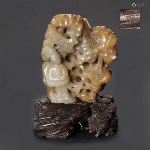 A Chinese Jade Carved Ornament With Zitan Hardwood Stand