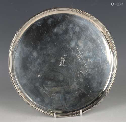 A George III silver circular card salver with raised reeded ...