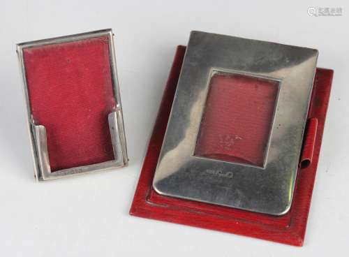 An Edwardian silver mounted red leather desk notepad holder ...