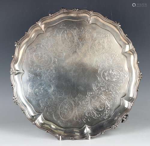 A Victorian silver circular salver, the centre engraved with...