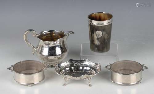 A pair of George V silver circular two-handled butter dishes...