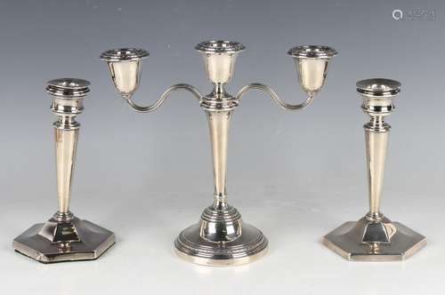 An Elizabeth II silver candlestick with matching detachable ...