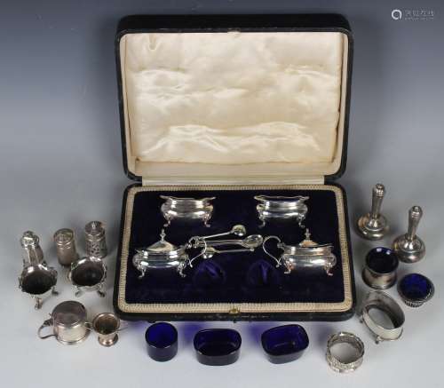A George V silver four-piece condiment set of squat baluster...