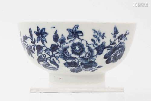 A Lowestoft round bowl, printed in blue with the Three Flowe...