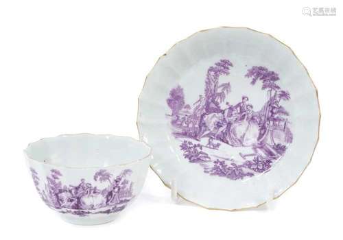 A Worcester tea bowl and saucer, printed in purple by Robert...