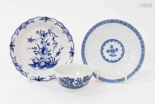 A Bow blue and white moulded saucer, a Worcester faceted blu...