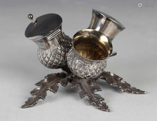 A late Victorian silver novelty condiment set, modelled as t...