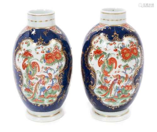 A pair of Worcester tea canisters, richly painted in Kakiemo...