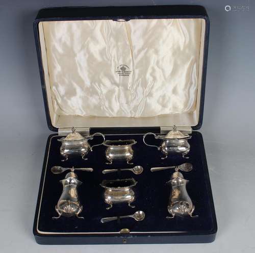 A George V silver six-piece condiment set of square form wit...